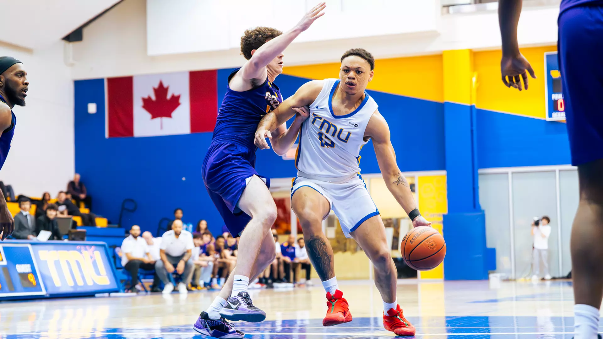 Rhooms' 27 Points, Wilson's Double-Double Push Bold to Fifth Straight Win